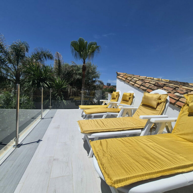 FOR SALE 🏡 Beachside Three-Bedroom Villa with Two Roof Terraces in a Gated Resort Community – Bahía Dorada, Estepona 🇪🇸