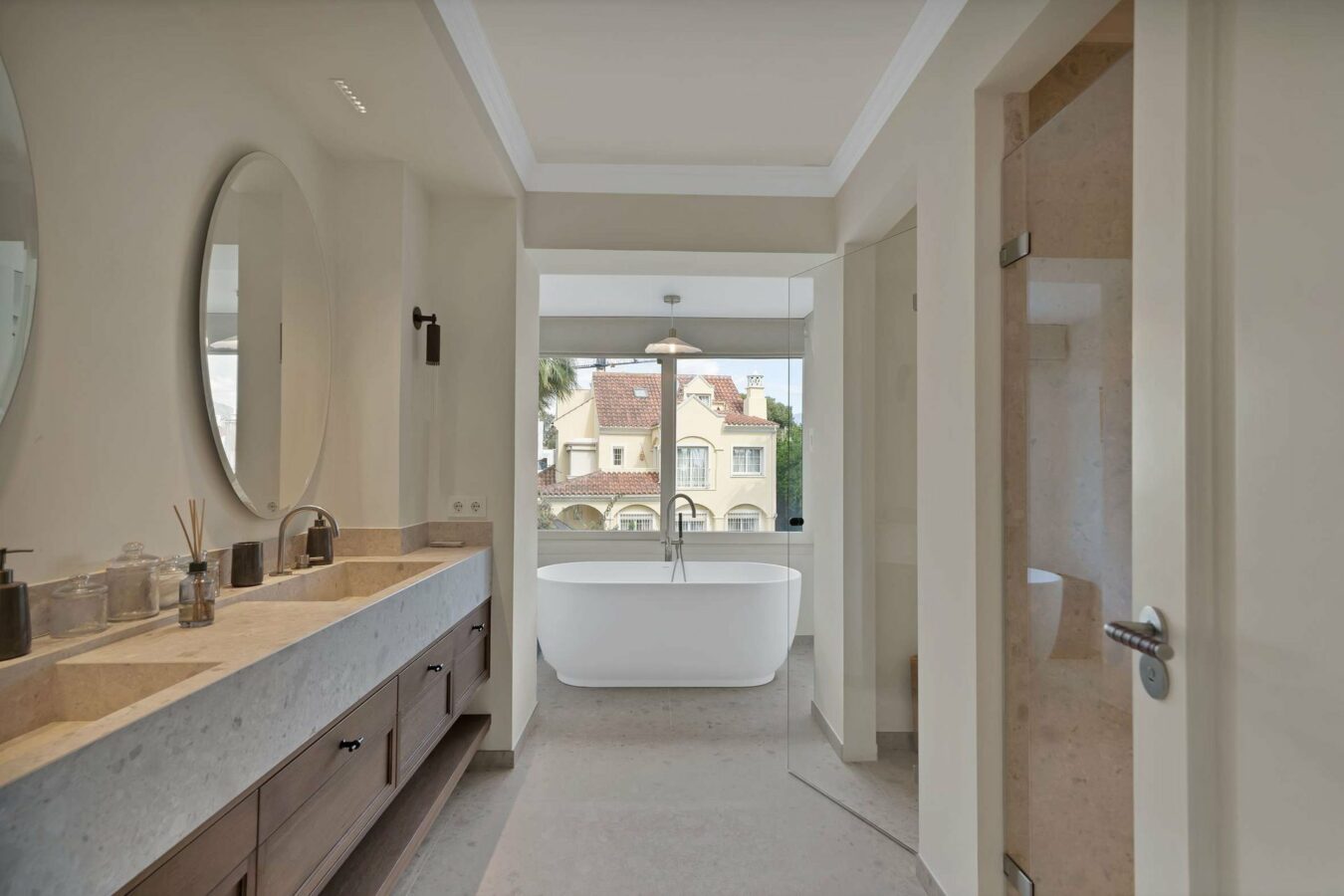 Bathroom with freestanding bath in the refurbished Puerto Banús villa