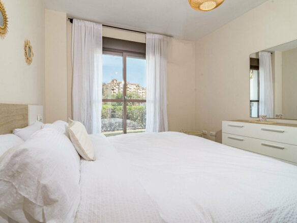 FOR SALE 🏡 Two-Bedroom Garden Apartment with Pool Views in a Gated Complex – Selwo, Estepona 🇪🇸