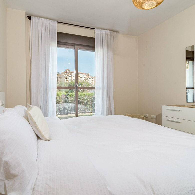 FOR SALE 🏡 Two-Bedroom Garden Apartment with Pool Views in a Gated Complex – Selwo, Estepona 🇪🇸