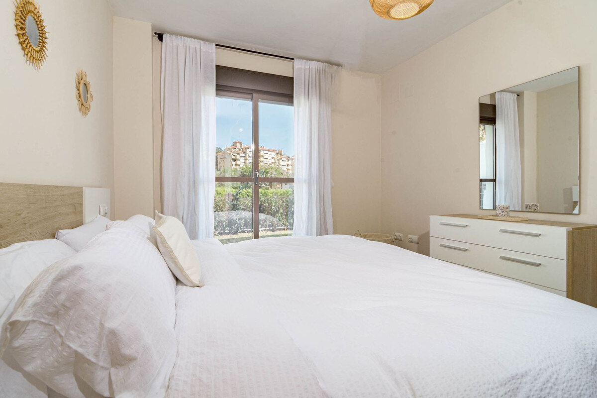 FOR SALE 🏡 Two-Bedroom Garden Apartment with Pool Views in a Gated Complex – Selwo, Estepona 🇪🇸