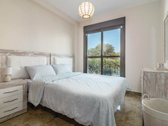 FOR SALE 🏡 Two-Bedroom Garden Apartment with Pool Views in a Gated Complex – Selwo, Estepona 🇪🇸
