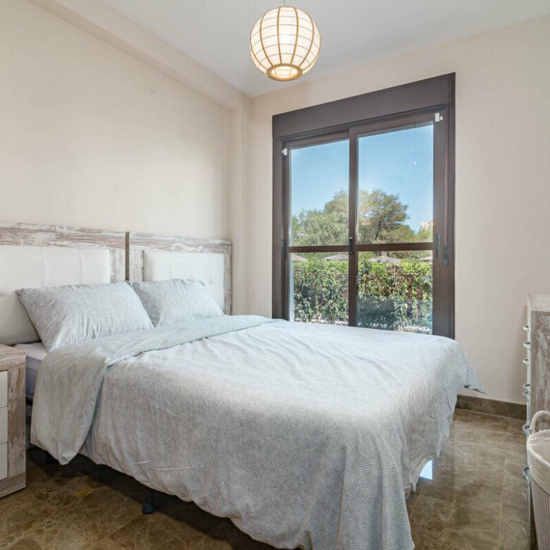 FOR SALE 🏡 Two-Bedroom Garden Apartment with Pool Views in a Gated Complex – Selwo, Estepona 🇪🇸