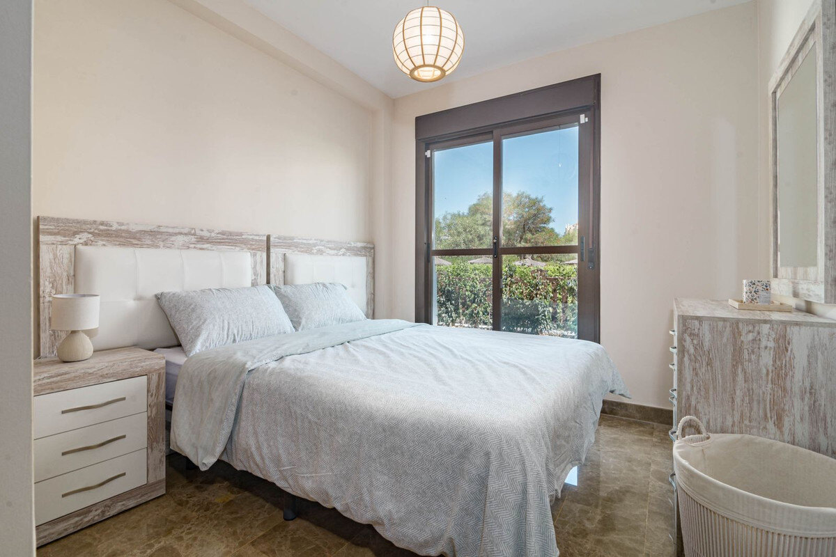 FOR SALE 🏡 Two-Bedroom Garden Apartment with Pool Views in a Gated Complex – Selwo, Estepona 🇪🇸