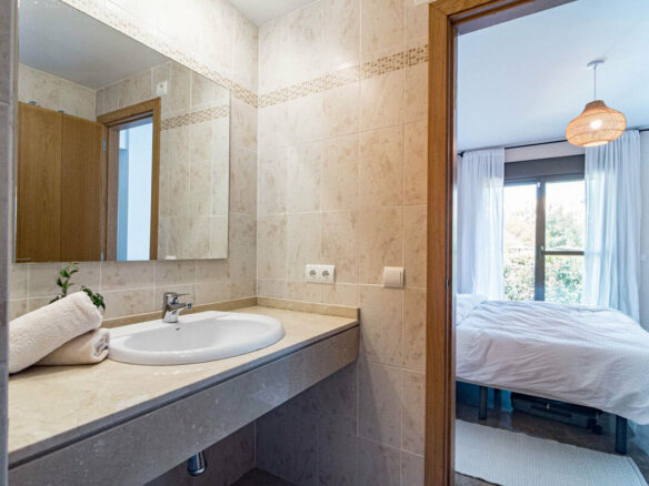 FOR SALE 🏡 Two-Bedroom Garden Apartment with Pool Views in a Gated Complex – Selwo, Estepona 🇪🇸