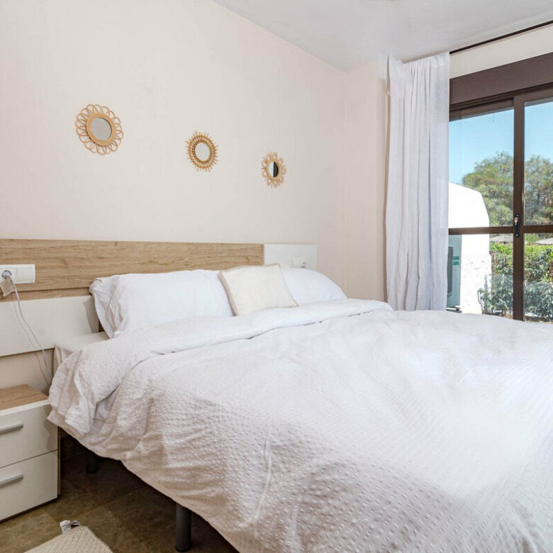 FOR SALE 🏡 Two-Bedroom Garden Apartment with Pool Views in a Gated Complex – Selwo, Estepona 🇪🇸