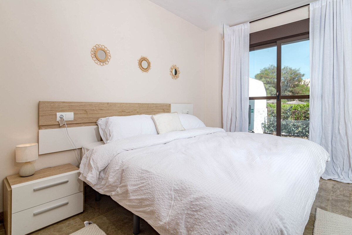 FOR SALE 🏡 Two-Bedroom Garden Apartment with Pool Views in a Gated Complex – Selwo, Estepona 🇪🇸