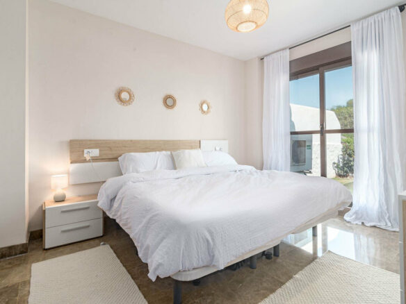 FOR SALE 🏡 Two-Bedroom Garden Apartment with Pool Views in a Gated Complex – Selwo, Estepona 🇪🇸