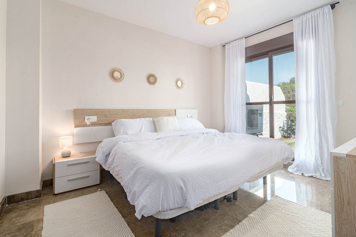 FOR SALE 🏡 Two-Bedroom Garden Apartment with Pool Views in a Gated Complex – Selwo, Estepona 🇪🇸