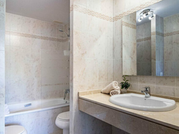 FOR SALE 🏡 Two-Bedroom Garden Apartment with Pool Views in a Gated Complex – Selwo, Estepona 🇪🇸