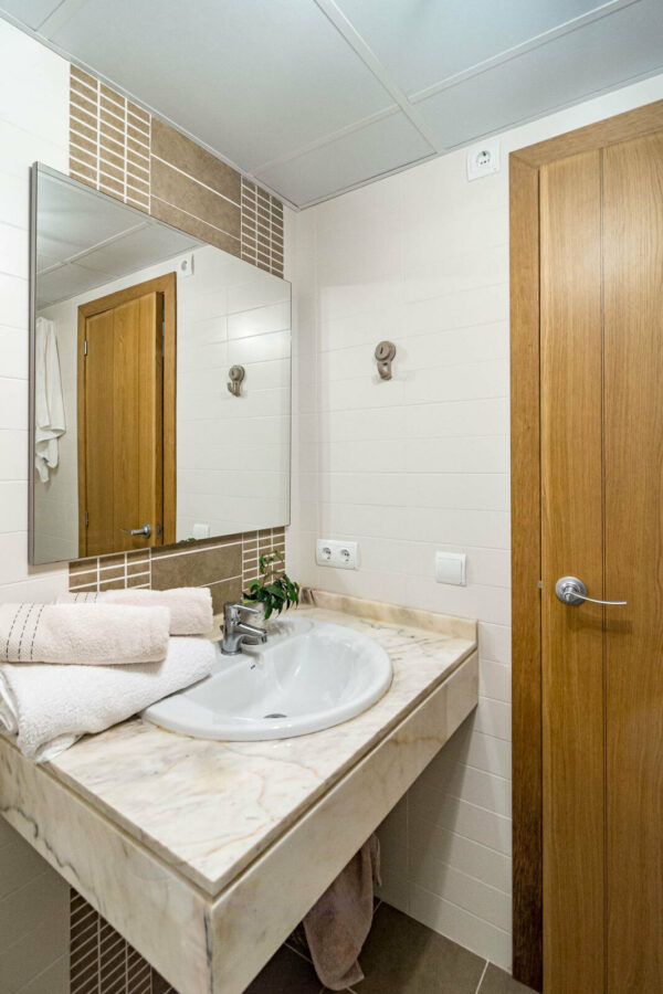FOR SALE 🏡 Two-Bedroom Garden Apartment with Pool Views in a Gated Complex – Selwo, Estepona 🇪🇸
