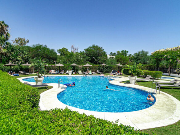 FOR SALE 🏡 Two-Bedroom Garden Apartment with Pool Views in a Gated Complex – Selwo, Estepona 🇪🇸