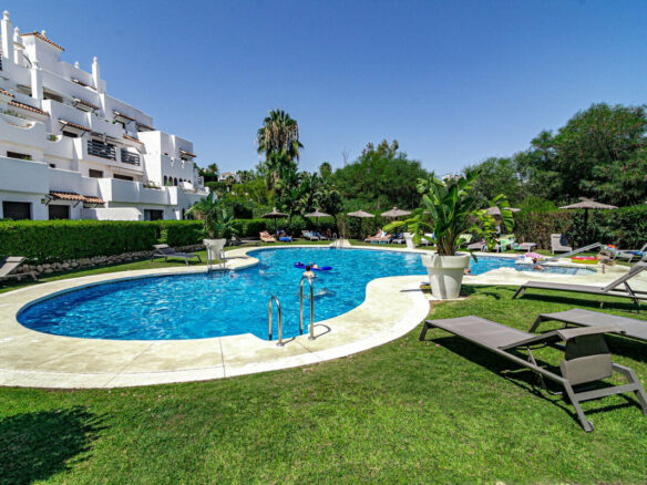 FOR SALE 🏡 Two-Bedroom Garden Apartment with Pool Views in a Gated Complex – Selwo, Estepona 🇪🇸