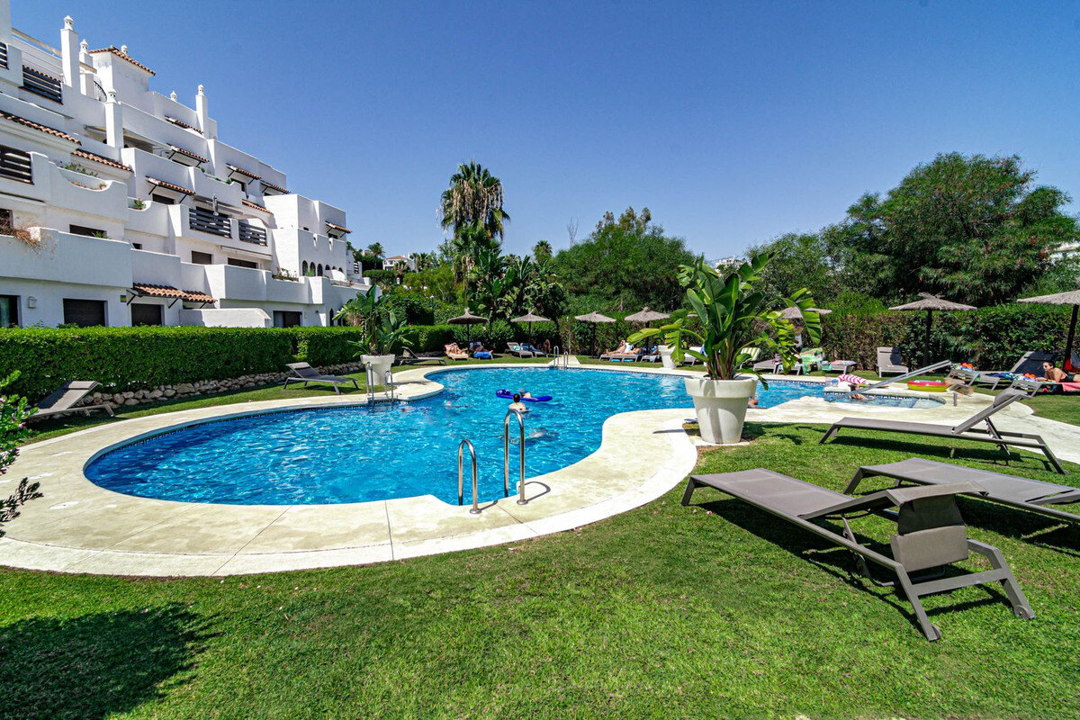 FOR SALE 🏡 Two-Bedroom Garden Apartment with Pool Views in a Gated Complex – Selwo, Estepona 🇪🇸