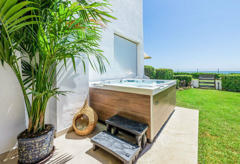FOR SALE 🏡 Renovated Frontline Beach Townhouse with Private Garden and Jacuzzi – Las Chapas, Marbella East 🇪🇸